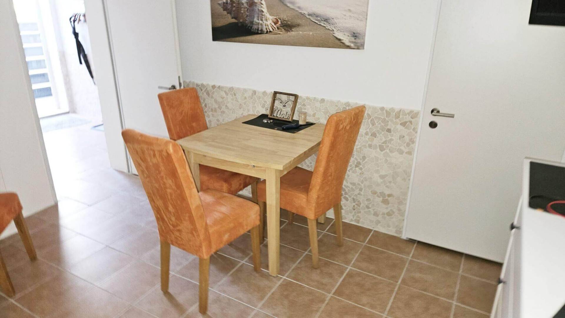 Esstisch Einliegerwohnung Ferienhaus Angela Kellenhusen